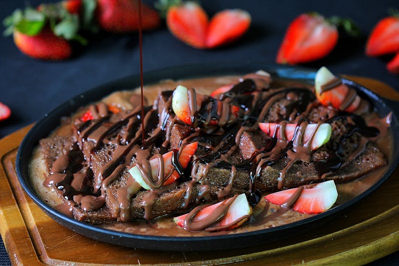 Nutella dessert pizza with strawberries and cream